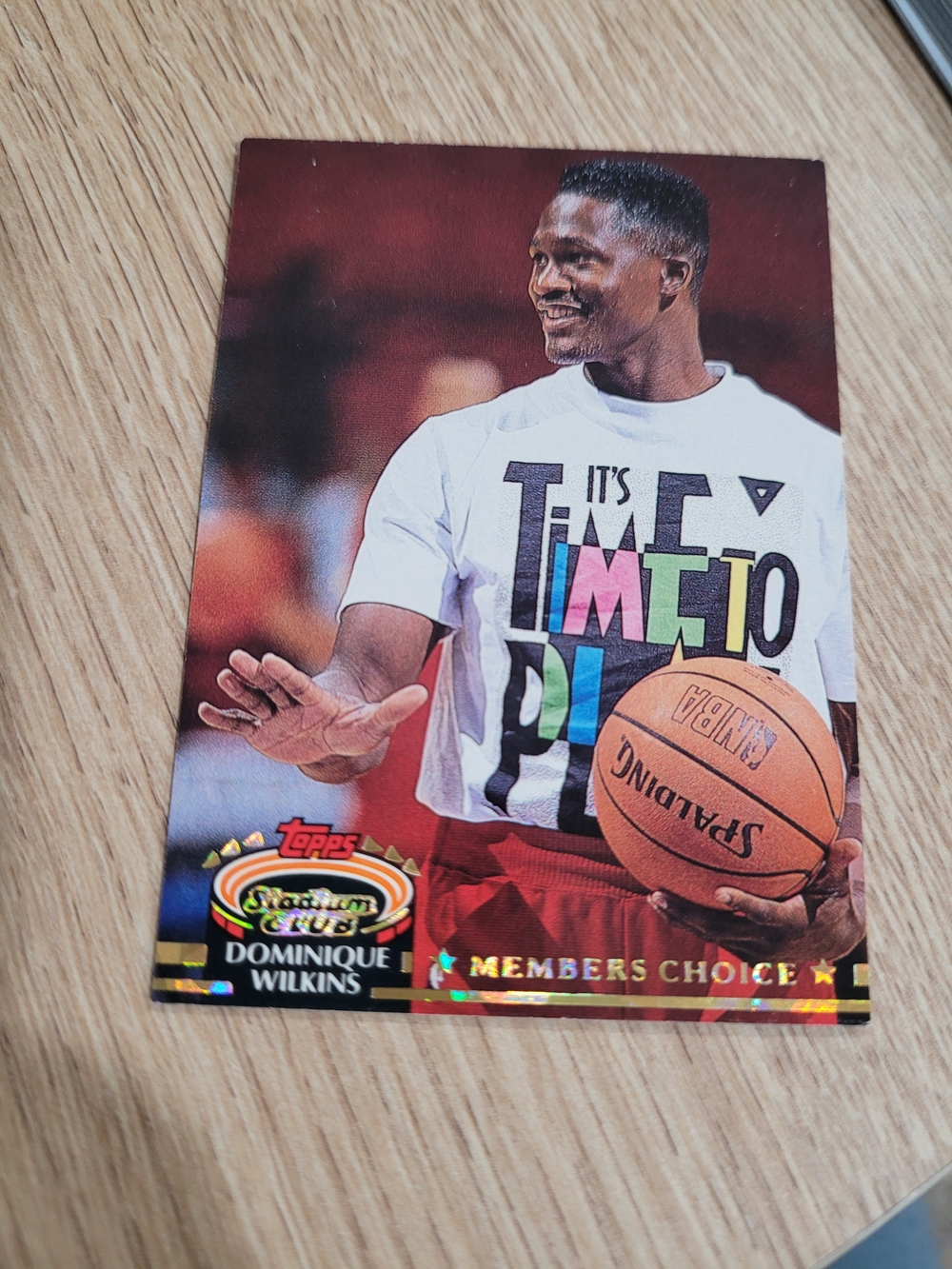 Topps Dominique Wilkins Card — White Tee with Multicolor Text